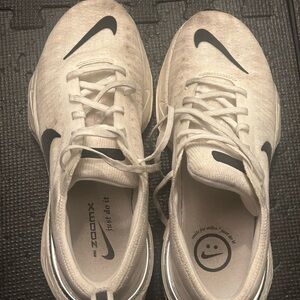 Nike White and Black Sneakers with Breathable Mesh and Padded Tongue